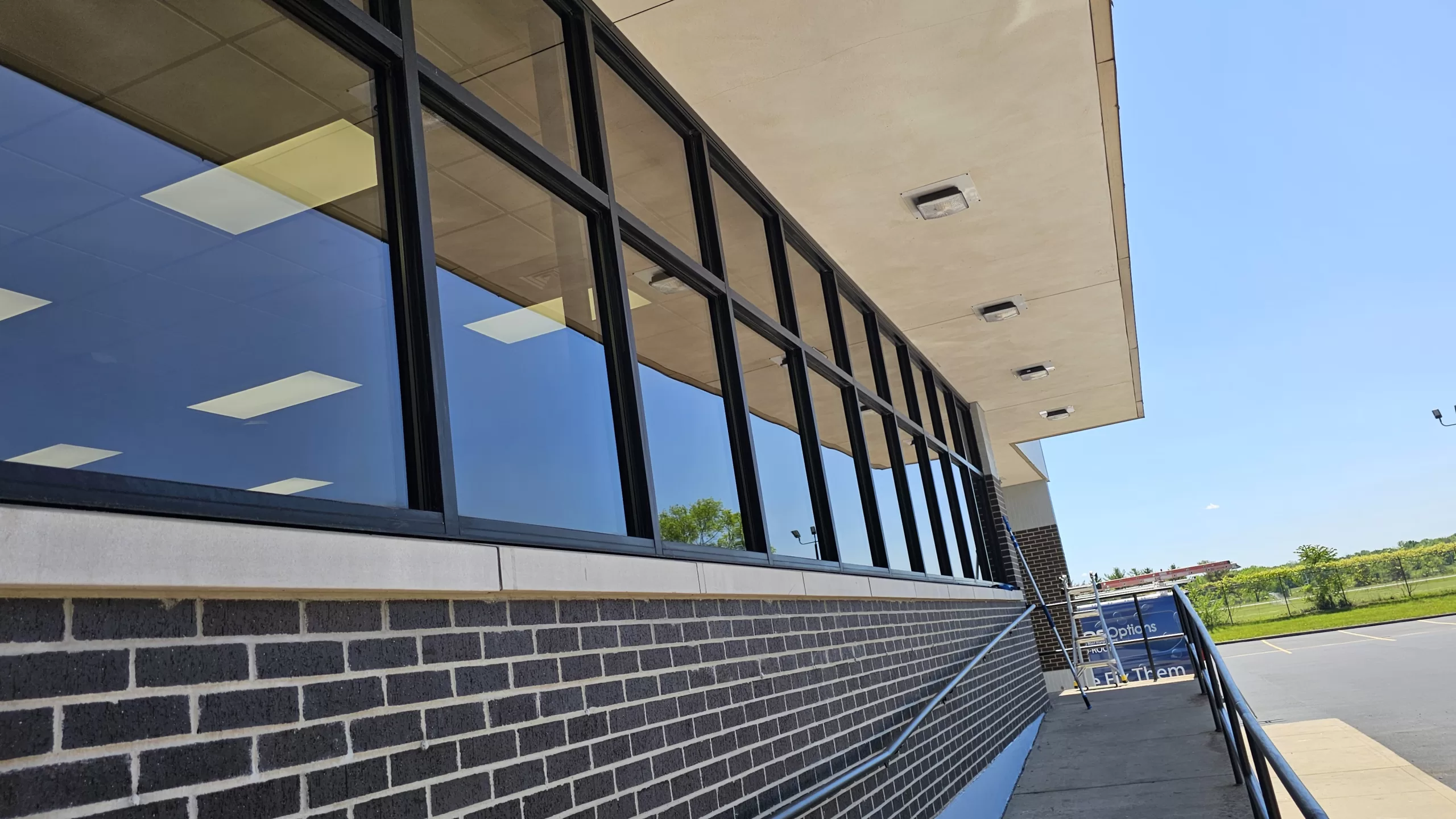 Professional clean windows showcasing Gem City Cleaning Crew's commercial window cleaning results and attention to detail