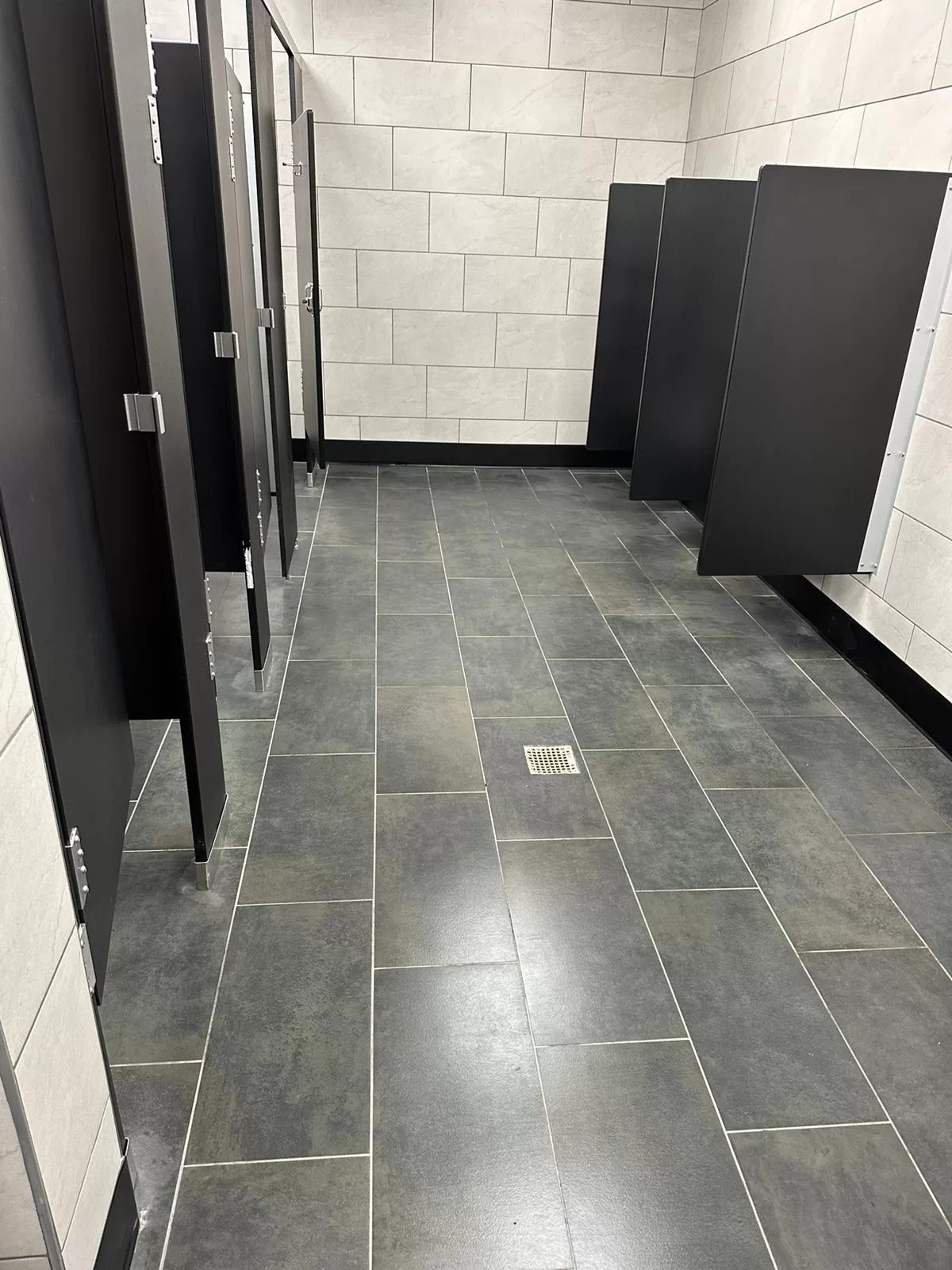 Commercial bathroom after professional deep cleaning and sanitization