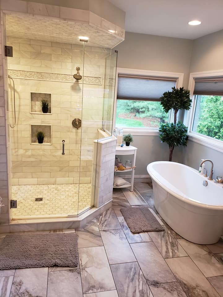 Professional recurring bathroom cleaning - sparkling clean bathtub and walk-in shower